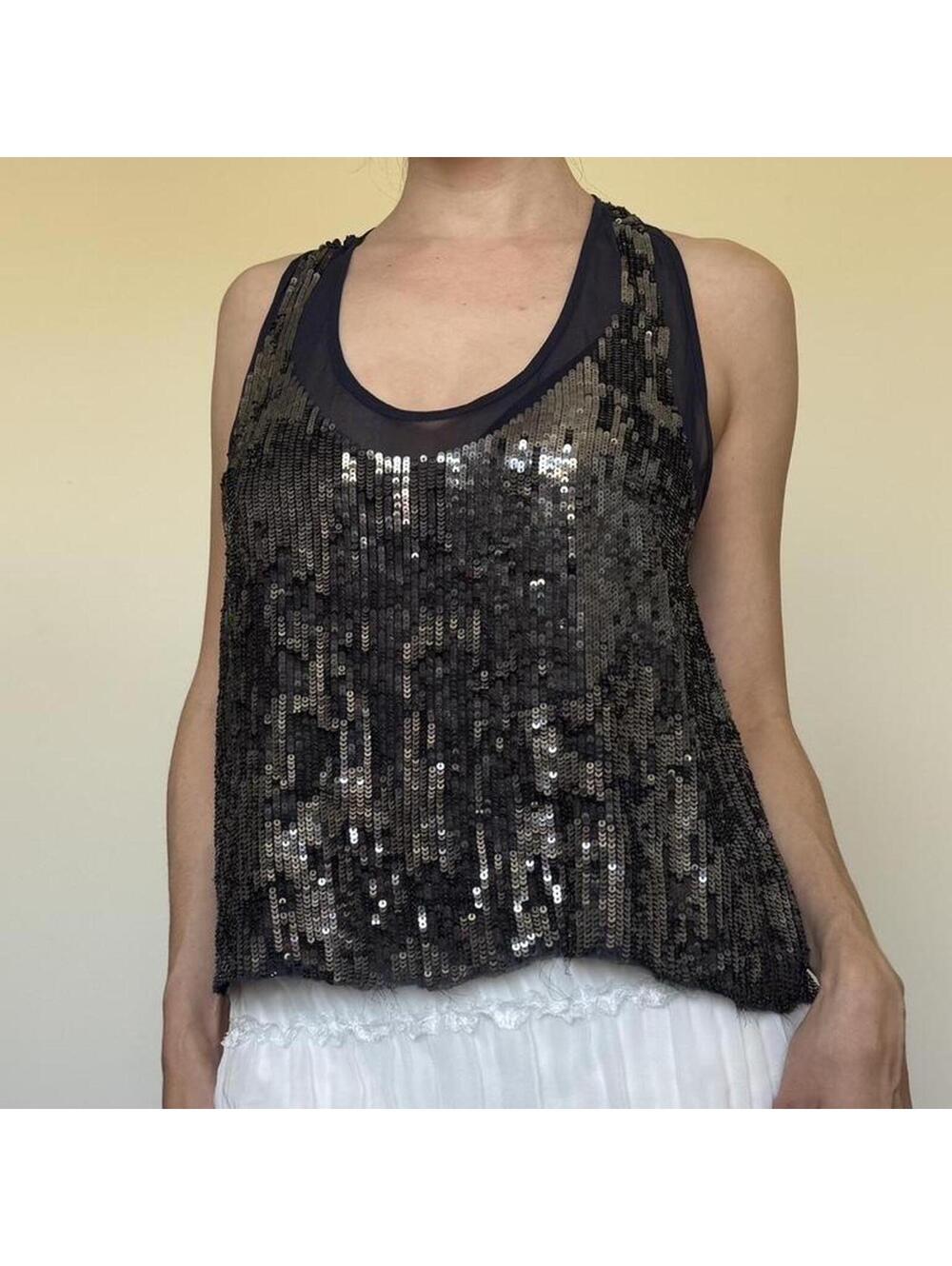 All over sequin racer back top. 100% silk. From Nicole Miller in a size M.
